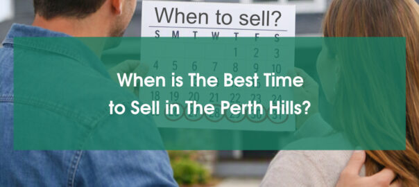 A young couple looking at their Perth Hills house and wondering when is the best time to sell it
